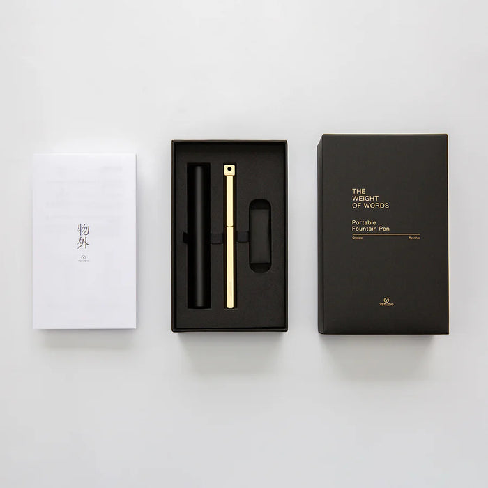 Y Studio Classic portable fountain pen with sleek design, metal body, and gold accents for smooth writing.