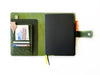 Jungle green leather A5 notebook folio by Eng Leather Co. with smooth leather cover and stitched edges.