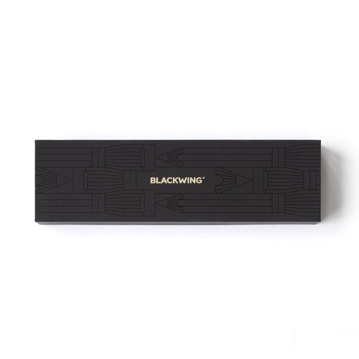Blackwing Pencil Essentials Set with various graphite pencils and accessories arranged on a neutral background.
