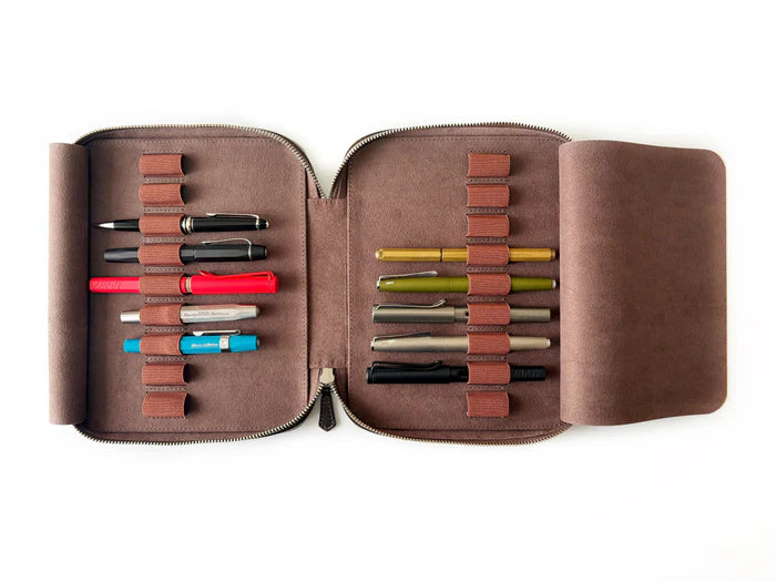 Eng Leather Co. 18 slot leather pen case in galaxy design, holding multiple pens, showing its sleek and organized storage.