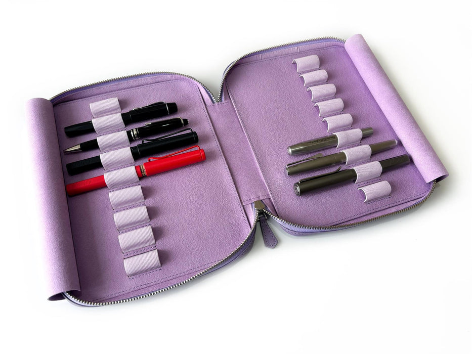 Light lavender leather pen case by Eng Leather Co. with 18 slots, designed for organizing pens in a sleek, compact case.