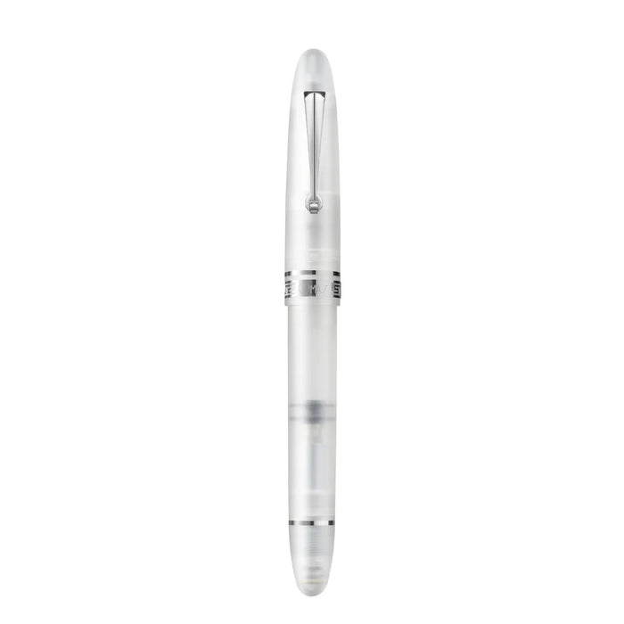 Omas Ogiva Demonstrator fountain pen with transparent body and gold accents, showcasing the pen's inner ink reservoir and elegant design.