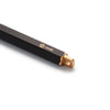 Y Studio Brassing portable black ballpoint pen with sleek design and metal accents, shown with black tail detail.