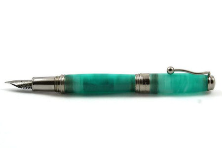 Jean-Pierre Lepine Indigo Classic Murano fountain pen with blue-green ink, showcasing a sleek, elegant design and smooth writing nib.