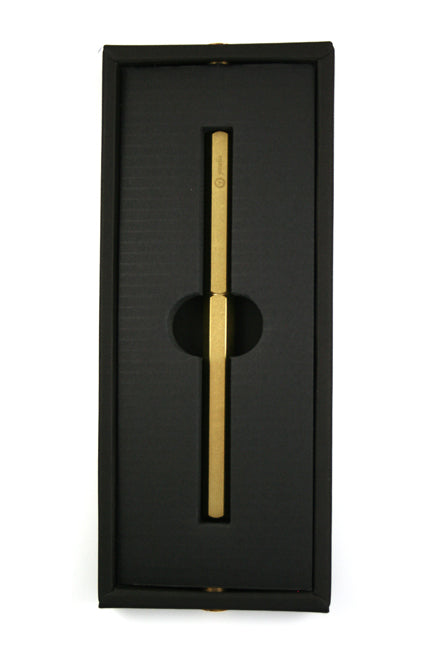 Y Studio Classic Revolve rollerball pen with brass body, sleek design, and smooth writing tip.