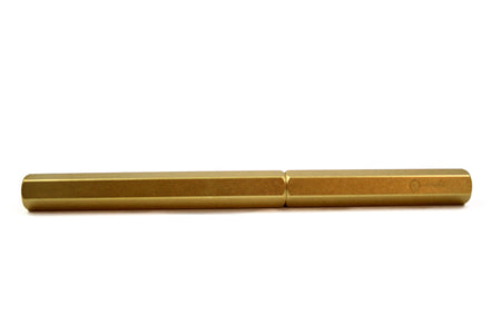 Y Studio Classic Revolve brass rollerball pen with sleek design, showcasing its polished metallic body and elegant writing tip.