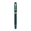 Omas Bologna Smeraldo Elegante fountain pen with green resin body and gold accents, displayed on a white background.