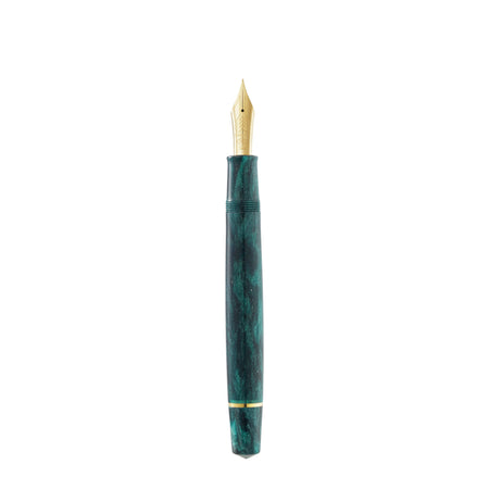 Omas Bologna Smeraldo Elegante fountain pen with green resin body and gold accents, showcasing a luxurious writing instrument.
