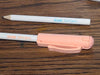 KUM Tip Top Pastel pens with pastel-colored caps and bodies, ideal for writing and drawing in soft pastel shades.