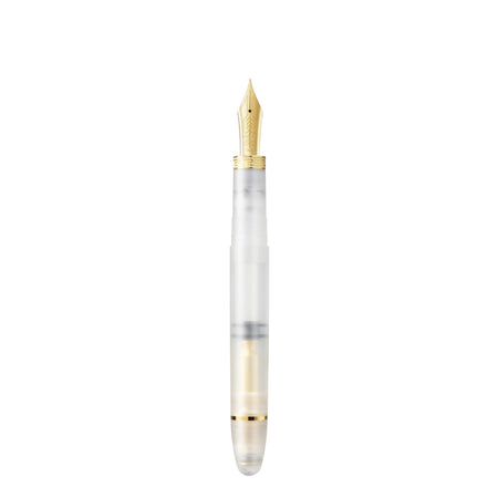 Omas Ogiva Demonstrator fountain pen with transparent body and silver cap, showcasing elegant design and smooth writing nib.