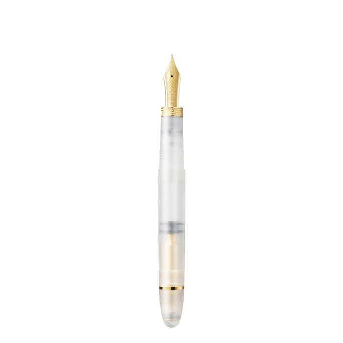 Omas Ogiva Demonstrator fountain pen with transparent body and silver cap, showcasing elegant design and smooth writing nib.