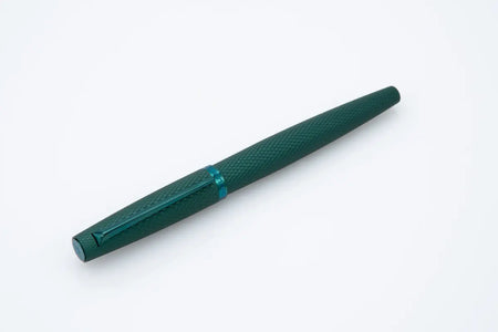Diplomat Viper green fountain pen with a sleek design and gold accents, showcasing its smooth writing nib and elegant body.