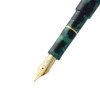 Esterbrook Niblet Evergreen fountain pen ink bottle with green ink visible in the glass container.