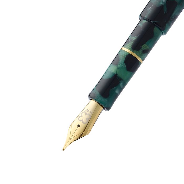 Esterbrook Niblet Evergreen fountain pen ink bottle with green ink visible in the glass container.