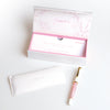 Pelikan M200 Cherry Blossom fountain pen with pink and white marbled design and gold accents on the cap and clip.