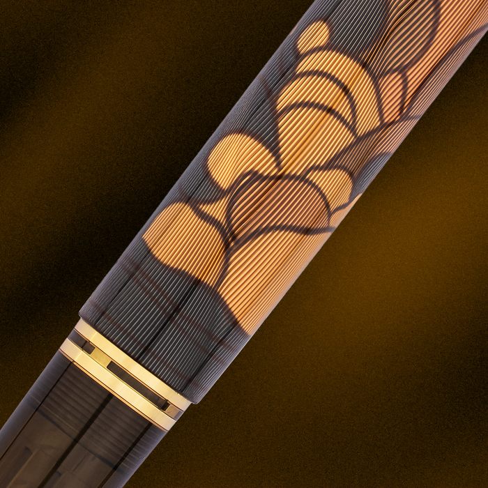 Pelikan Souverän M600 Art Collection Georg Tippel fountain pen with gold accents and intricate design on the barrel.