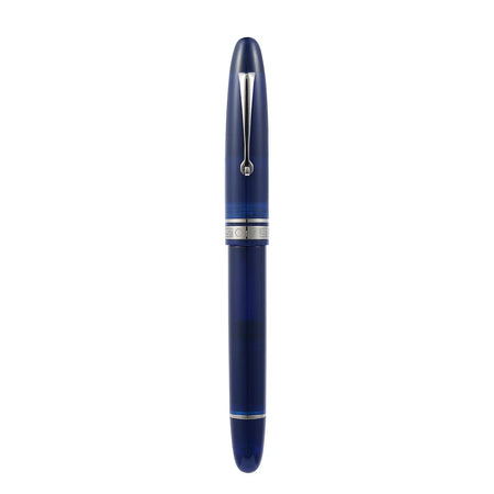 Omas Ogiva blue fountain pen with gold accents and sleek design, close-up view of the pen's nib and barrel.