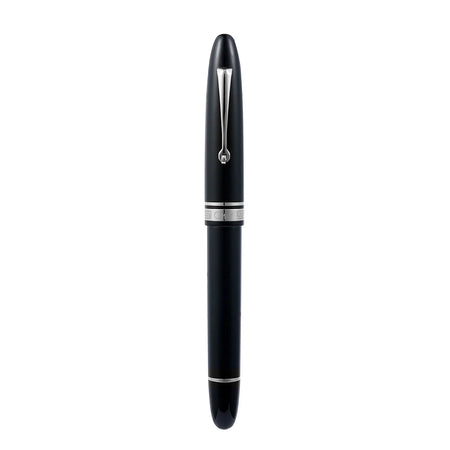 Omas Ogiva Nera fountain pen with black resin body and gold clip, showcasing its elegant cap and sleek design.