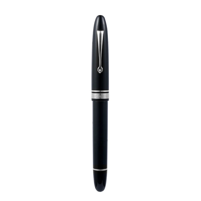 Omas Ogiva Nera fountain pen with black resin body and gold clip, showcasing its elegant cap and sleek design.
