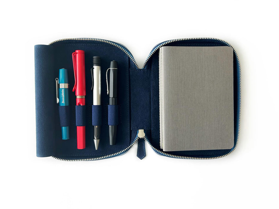 Eng Leather Co. 4-slot leather A6 pen case in Night Sky color, with four pens nestled inside, showcasing sleek craftsmanship and design.