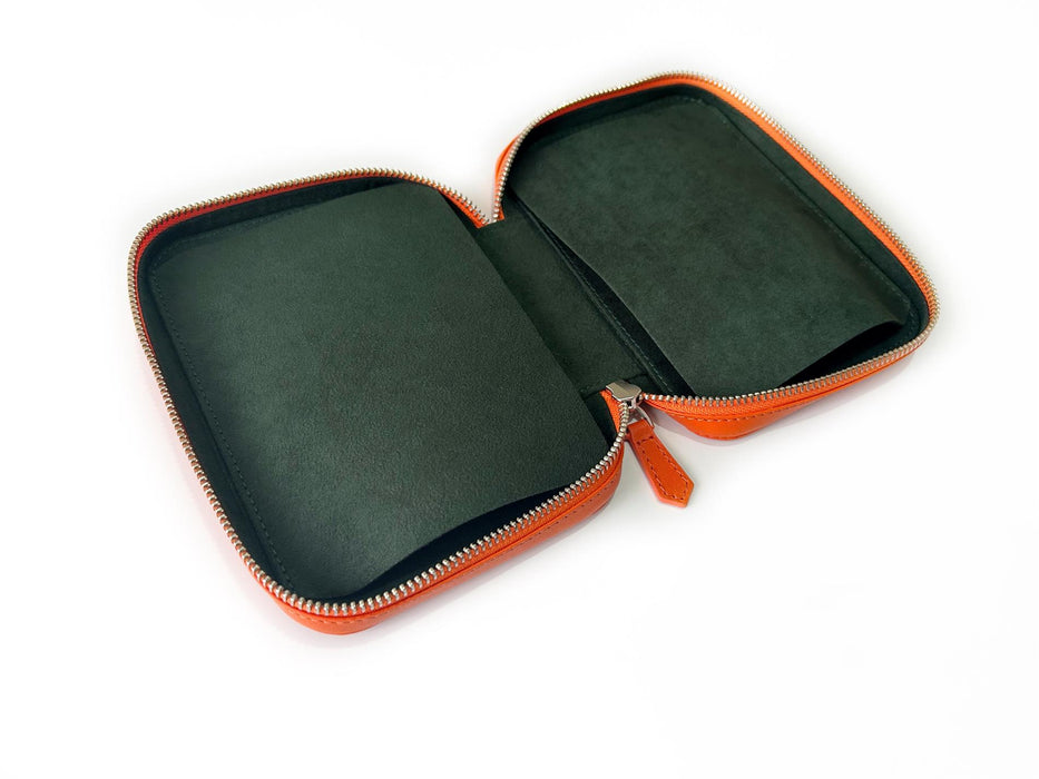 Eng Leather Co. pumpkin leather 4-slot A6 pen case with stitched detailing and spacious compartments for pens and accessories.
