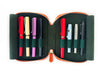 Eng Leather Co. pumpkin leather 4-slot A6 pen case with four pens inside, showcasing a stylish and functional storage solution.