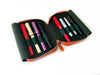 Eng Leather Co. pumpkin-colored leather 4-slot A6 pen case with visible stitching and sleek design for stylish pen storage.