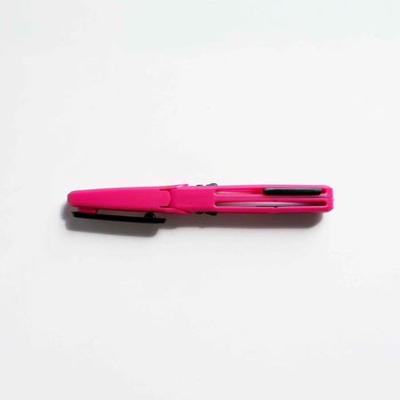 Pink KUM Pocket Scissors with compact design and stainless steel blades, ideal for precise cutting on the go.