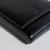 Black leather pen case from Eng Leather Co. with five compartments, designed for elegant and organized storage of writing instruments.