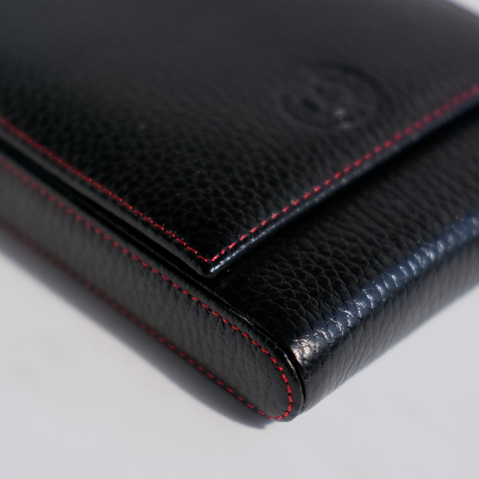 Black leather pen case from Eng Leather Co. with five compartments, designed for elegant and organized storage of writing instruments.