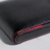 Black leather pen case by Eng Leather Co. with five compartments, sleek design, and durable construction for organizing pens.