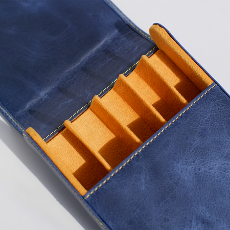 Blue leather pen case by Eng Leather Co. with five compartments for storing pens and writing instruments.