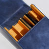 Blue leather pen case by Eng Leather Co. with five compartments, designed to hold and organize pens securely.