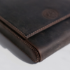 Dark brown Eng Leather Co. 5 pen hard case with sturdy design and smooth leather exterior, ideal for storing and protecting pens.