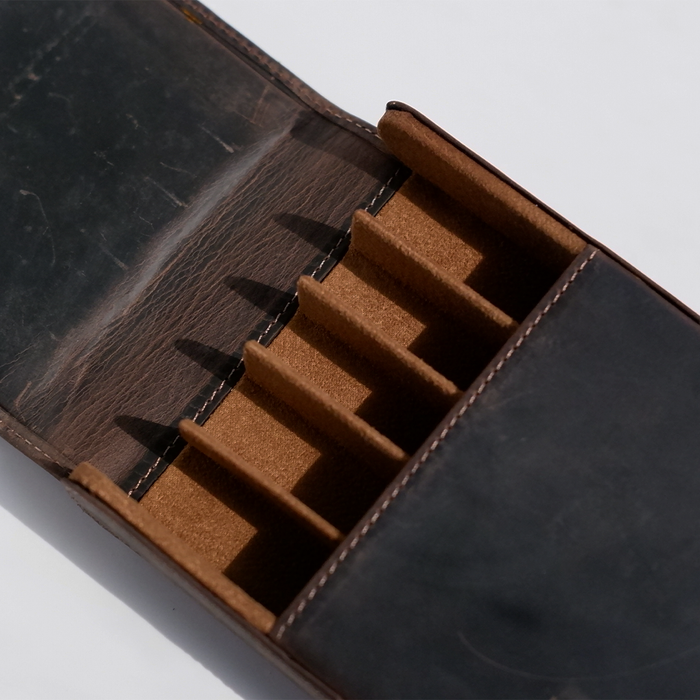 Dark brown Eng Leather Co. 5 pen hard case with sturdy exterior and secure closure, designed to protect and organize writing instruments.