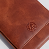 Light brown Eng Leather Co. 5 Pen Hard Case with sturdy exterior and secure closure, designed to protect and organize pens.