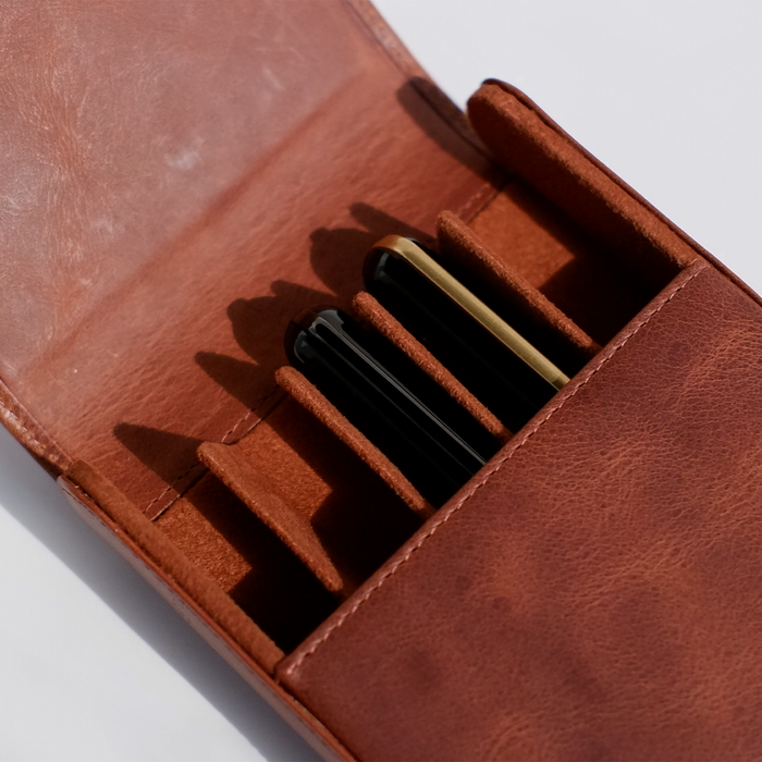 Light brown Eng Leather Co. 5 Pen Hard Case with sturdy exterior and secure closure, designed for elegant pen storage.