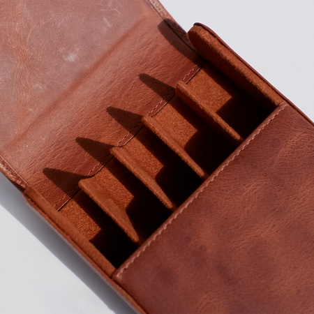 Light brown Eng Leather Co. 5 Pen Hard Case with secure snap closure, designed for stylish pen storage and protection.
