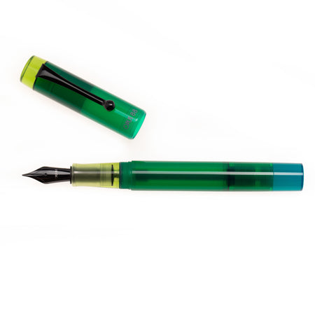 Close-up of an Opus 88 Green Demo fountain pen showing the detailed green resin body and metal nib.