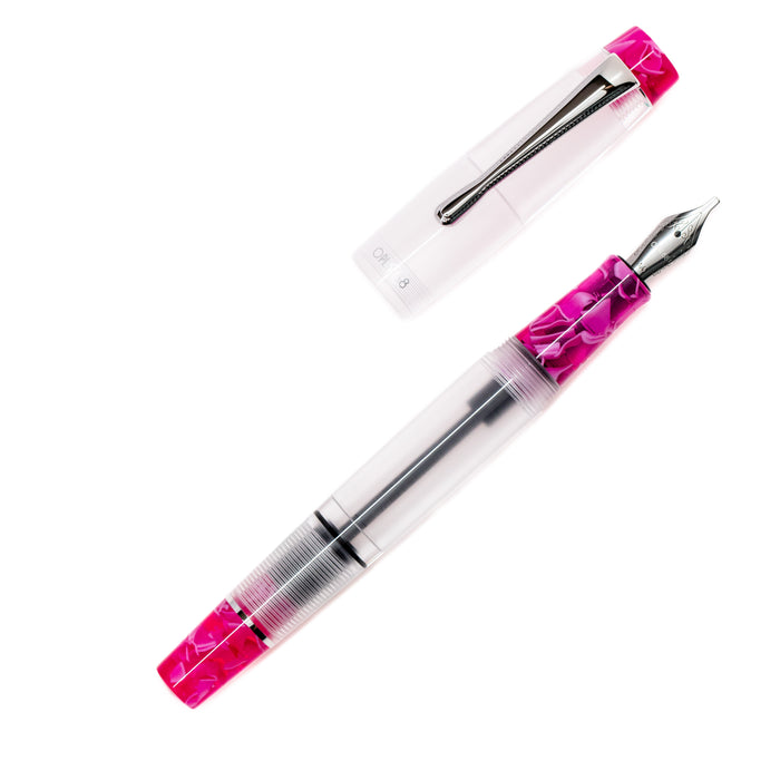 Opus 88 KOLORO hot pink fountain pen with black grip section and gold accents, showcasing a stylish writing instrument.