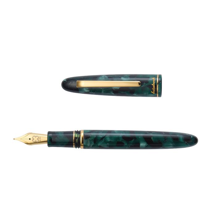 Esterbrook Estie Evergreen fountain pen ink bottle with green ink, showcasing the product and colorful liquid inside.