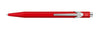 Caran D'Ache 849™ ballpoint pen with a sleek metal body and signature hexagon design, shown in a close-up view.