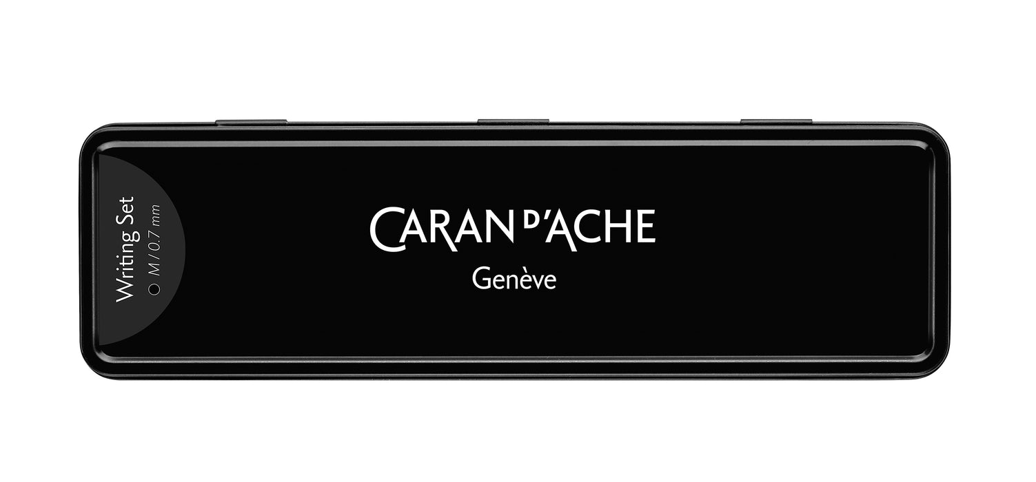 Caran D'Ache Set 849 Black Code ballpoint pen and mechanical pencil in a sleek black box, featuring 0.7mm lead for writing and drawing.