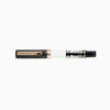 Twsbi Eco Smoke Rose Gold fountain pen with transparent body and rose gold accents, showing the pen's clip and nib.
