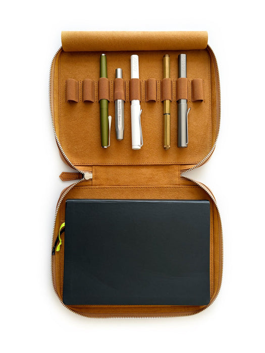 Eng Leather Co. 9-slot Apple leather pen case in camel vegan leather, with nine pens inserted, on a neutral background.