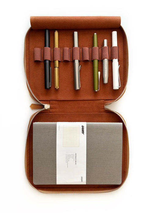 Eng Leather Co. 9-slot vegan leather pen case in camel color with nine pens inside, designed for Apple pens and accessories.