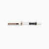 Twsbi Eco fountain pen in white with rose gold accents, featuring a sleek design and smooth ink flow.