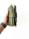 A6 leather journal cover in jungle green by Eng Leather Co., showcasing smooth leather and secure closure.