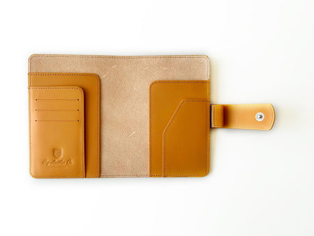 Aged natural leather A6 journal cover by Eng Leather Co. with textured finish and open design for notebooks.