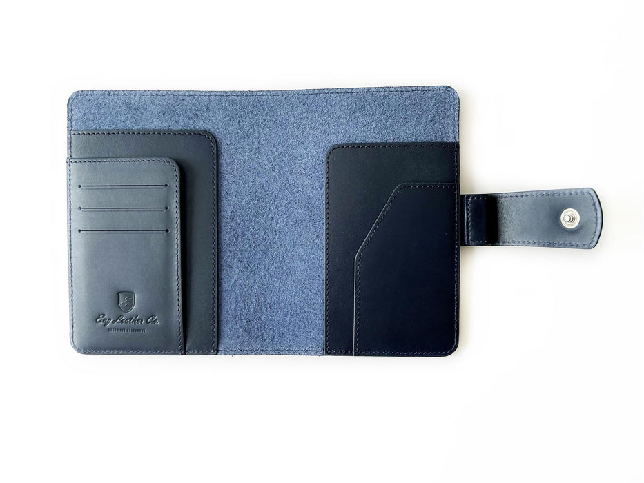 A6 size navy blue leather journal cover by Eng Leather Co. with smooth texture and stitched edges.